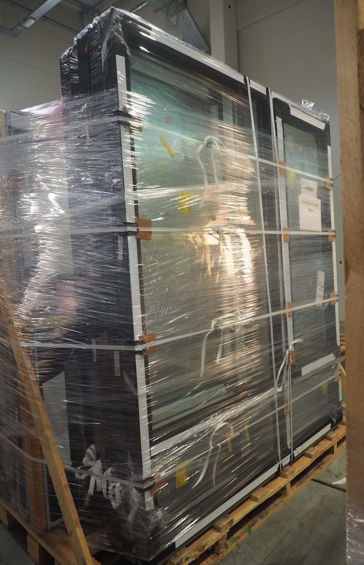 This is what the rule looks like: units upright on edge, on battens, braced and wrapped, with air around them.