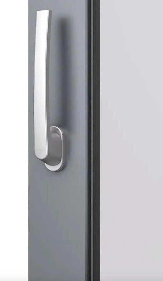 The inside lever of the sliding door, straight on, in the locked position