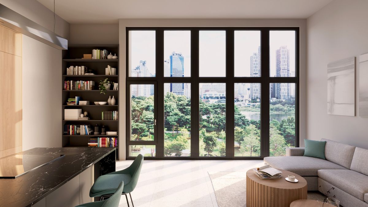 A living room with a wall of black Vistaza windows